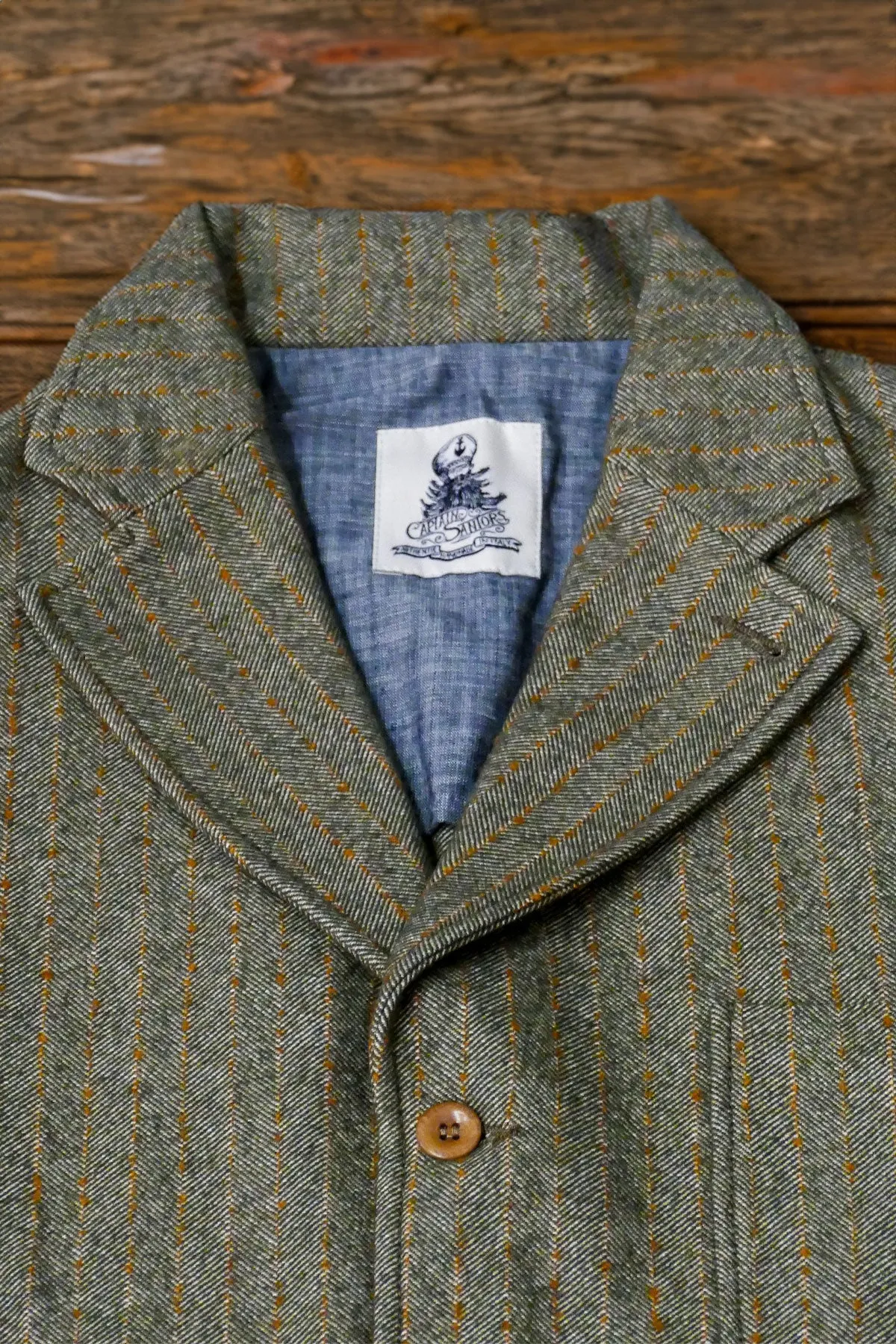 Captain Santors - Herringbone Lawyer Jacket in muted military green with rust stripes